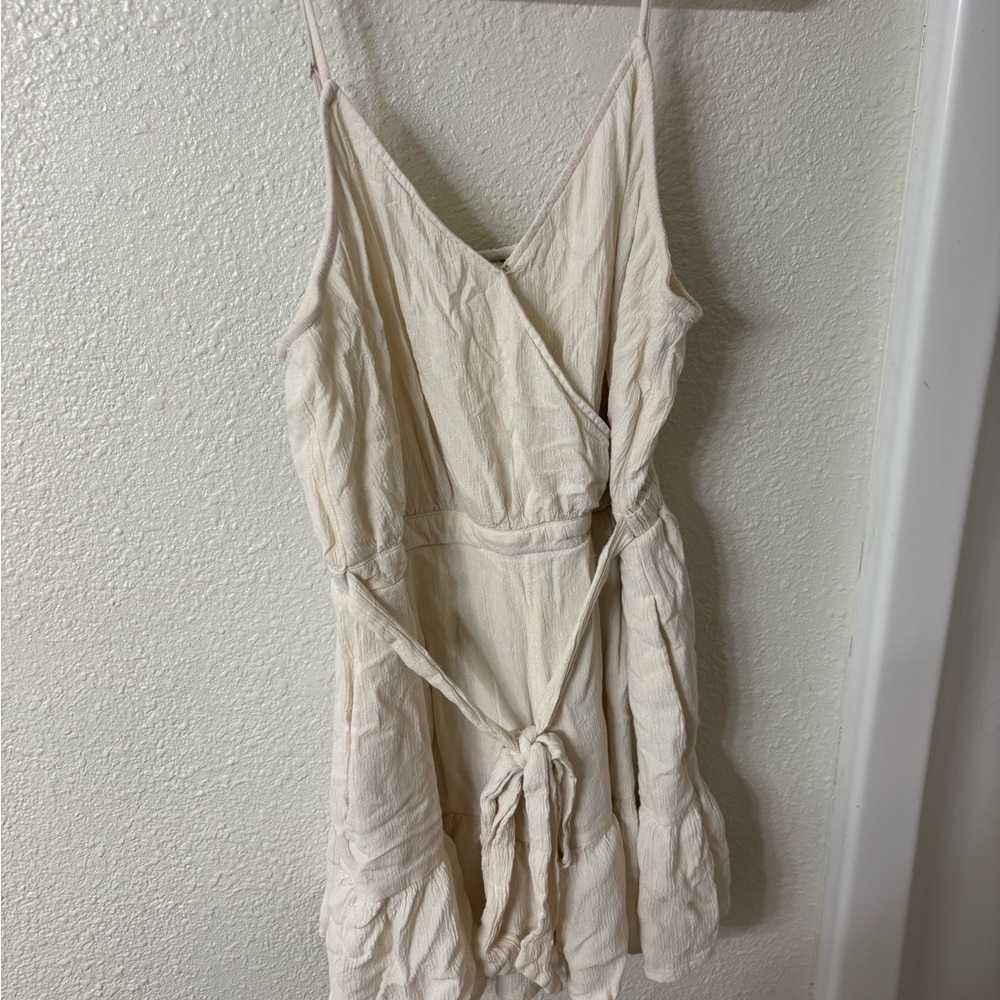 American Eagle Cream Wrap Romper